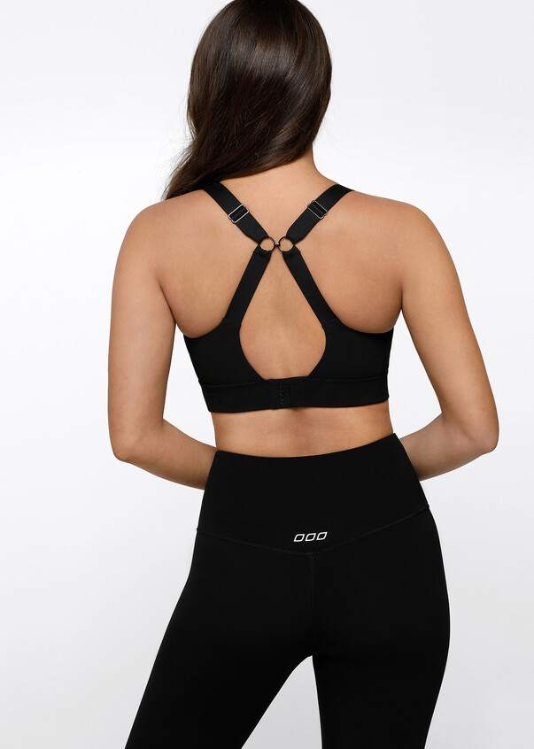 HIIT reflective logo sports bra in black - ShopStyle